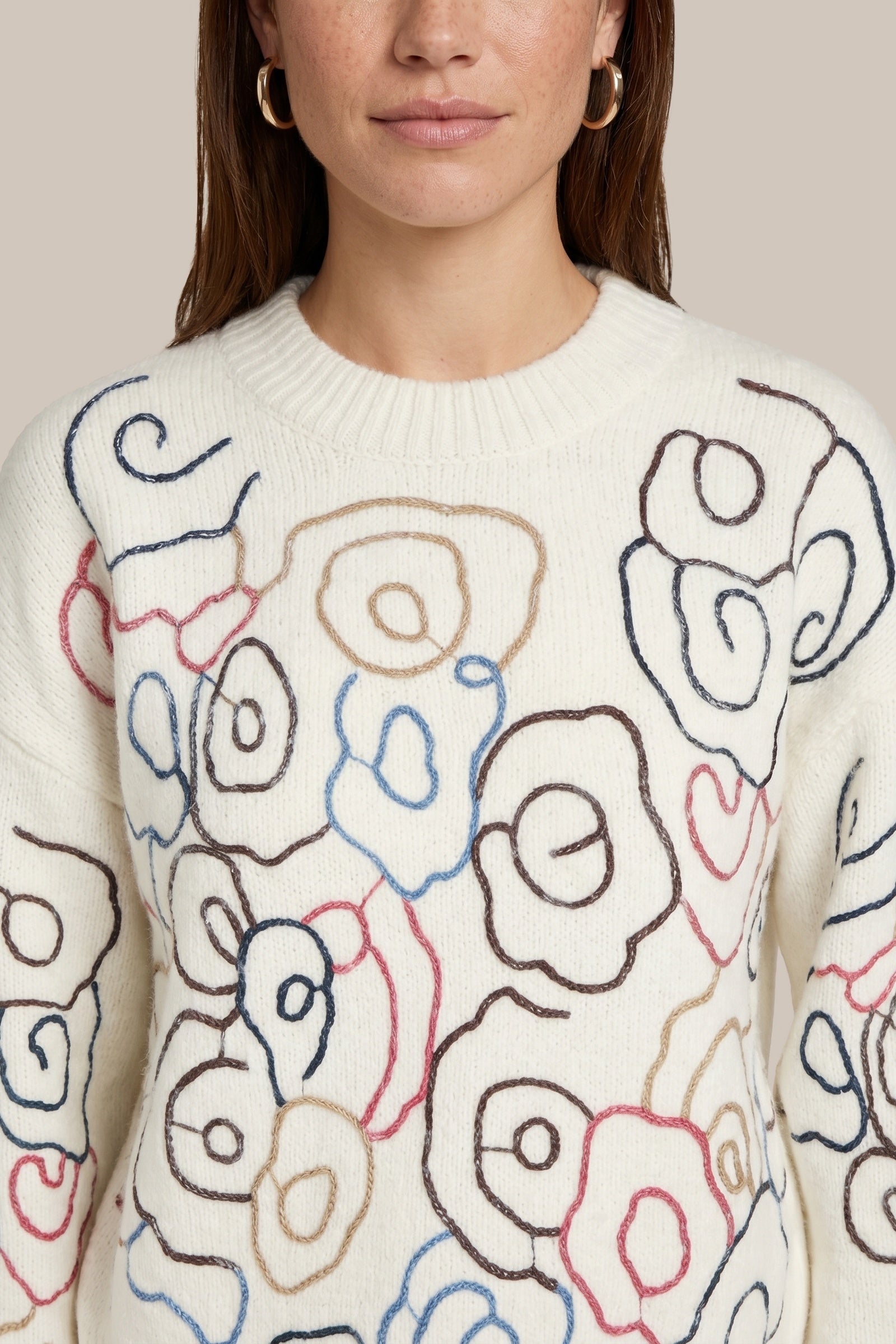 Pull à imprimé fleurs esquissées