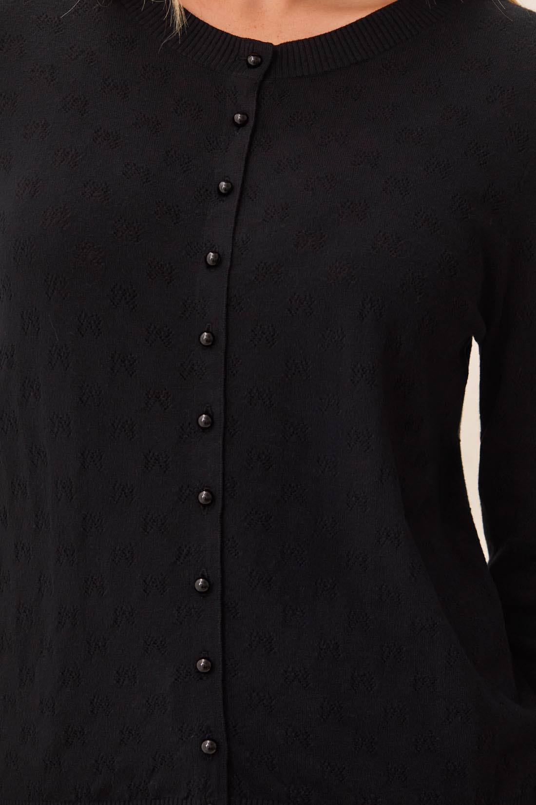 Cardigan noir à motifs ajourés