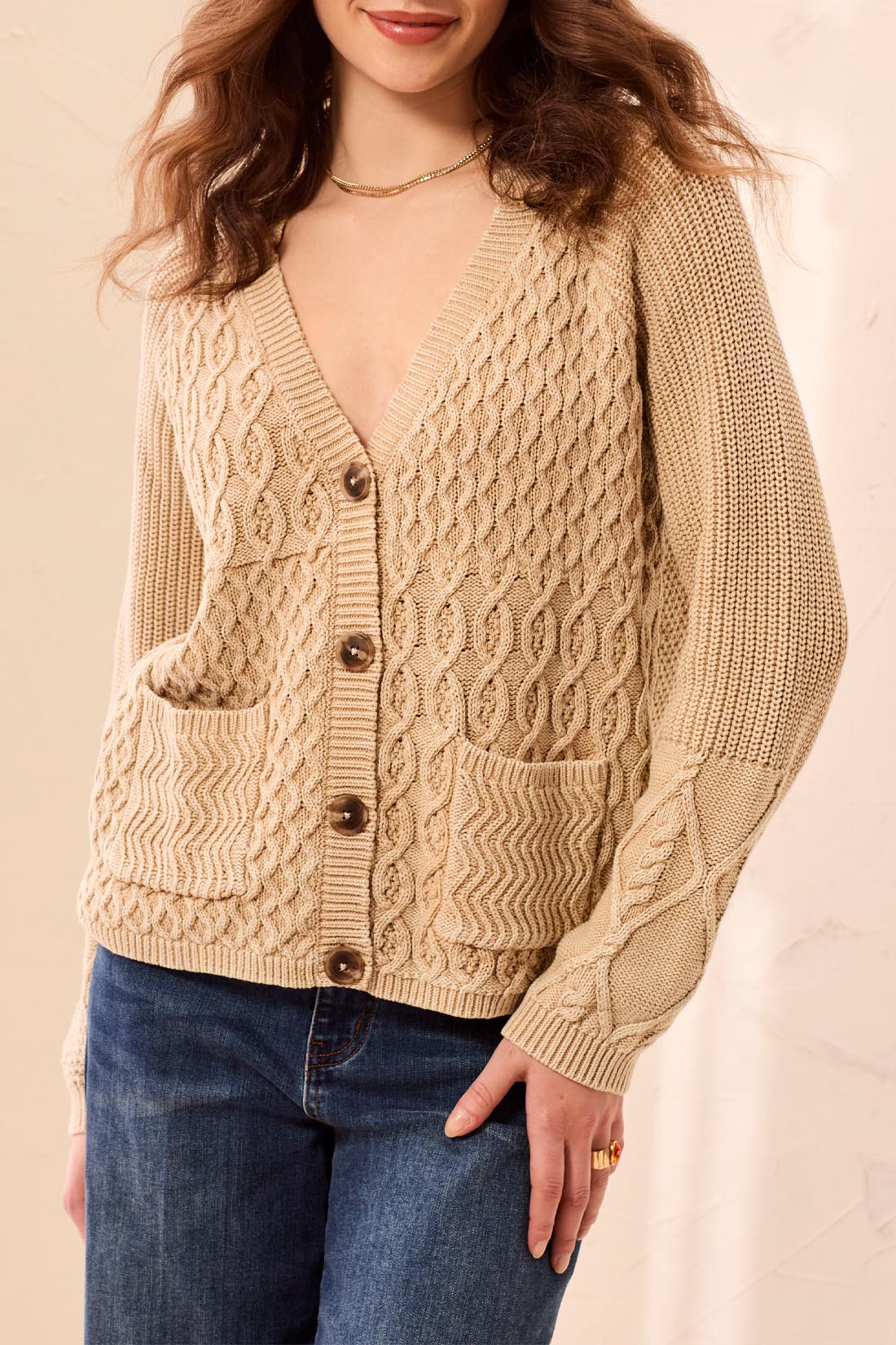 Cardigan beige à torsades