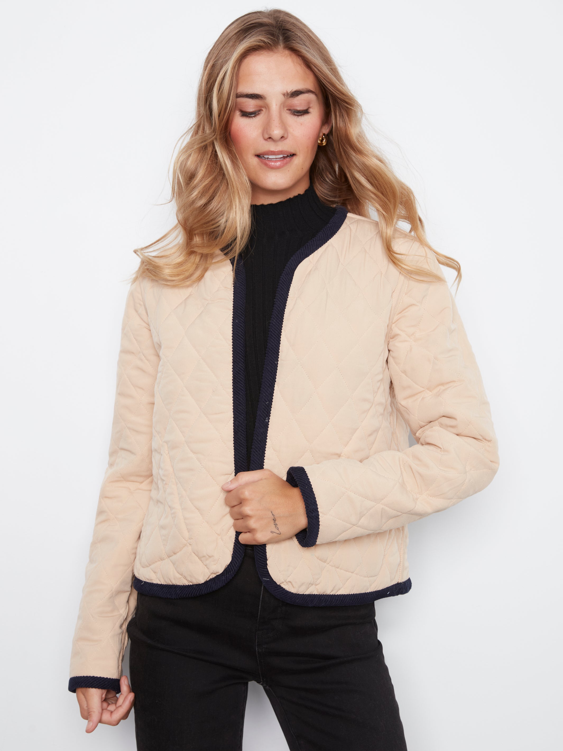 Veste matelassée réversible avec broderies
