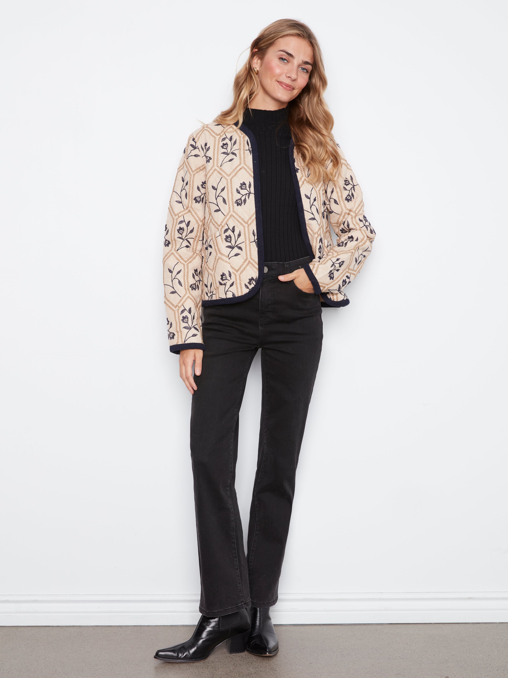 Veste matelassée réversible avec broderies
