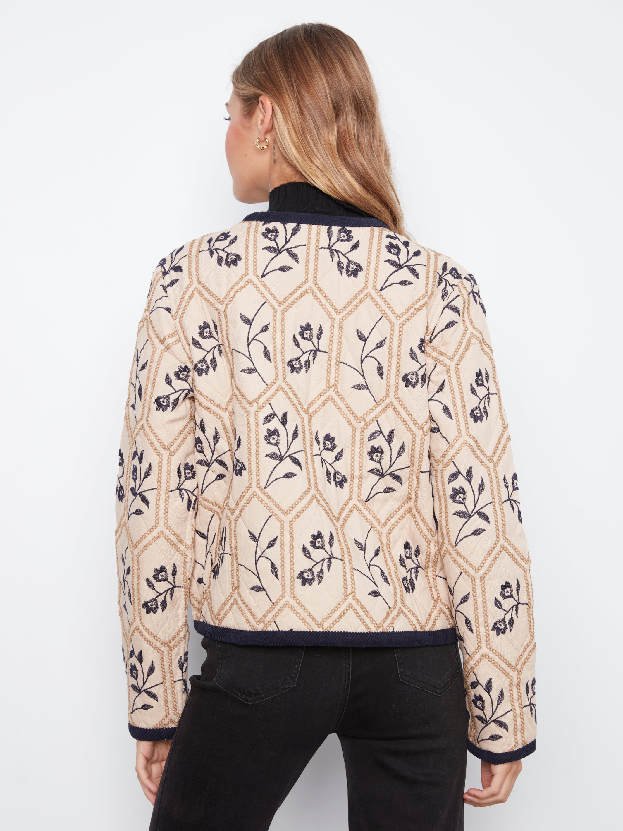 Veste matelassée réversible avec broderies