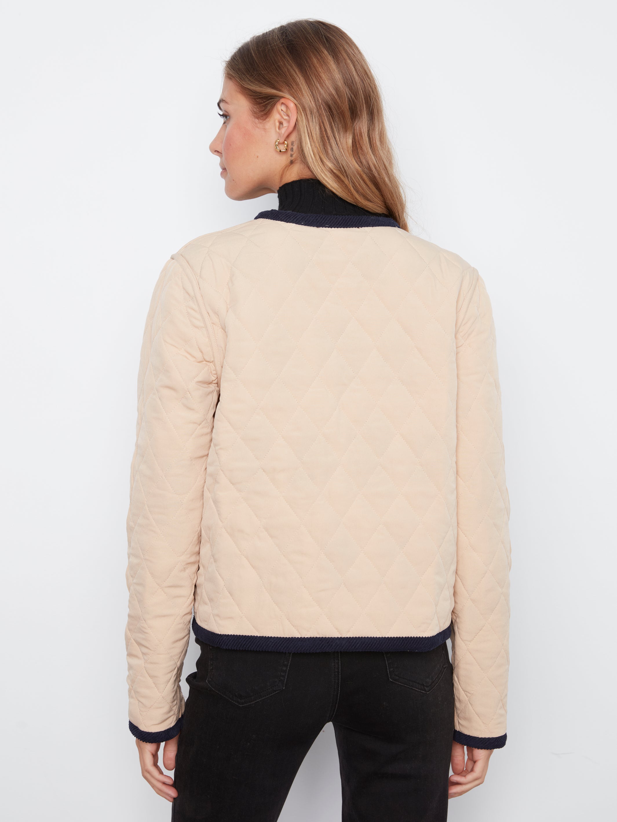 Veste matelassée réversible avec broderies